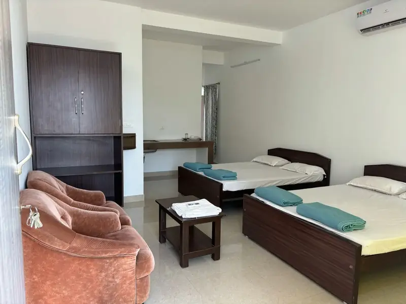 Room 102 River View – spacious room with 2 beds at Francis Doris Skate City Mangaluru